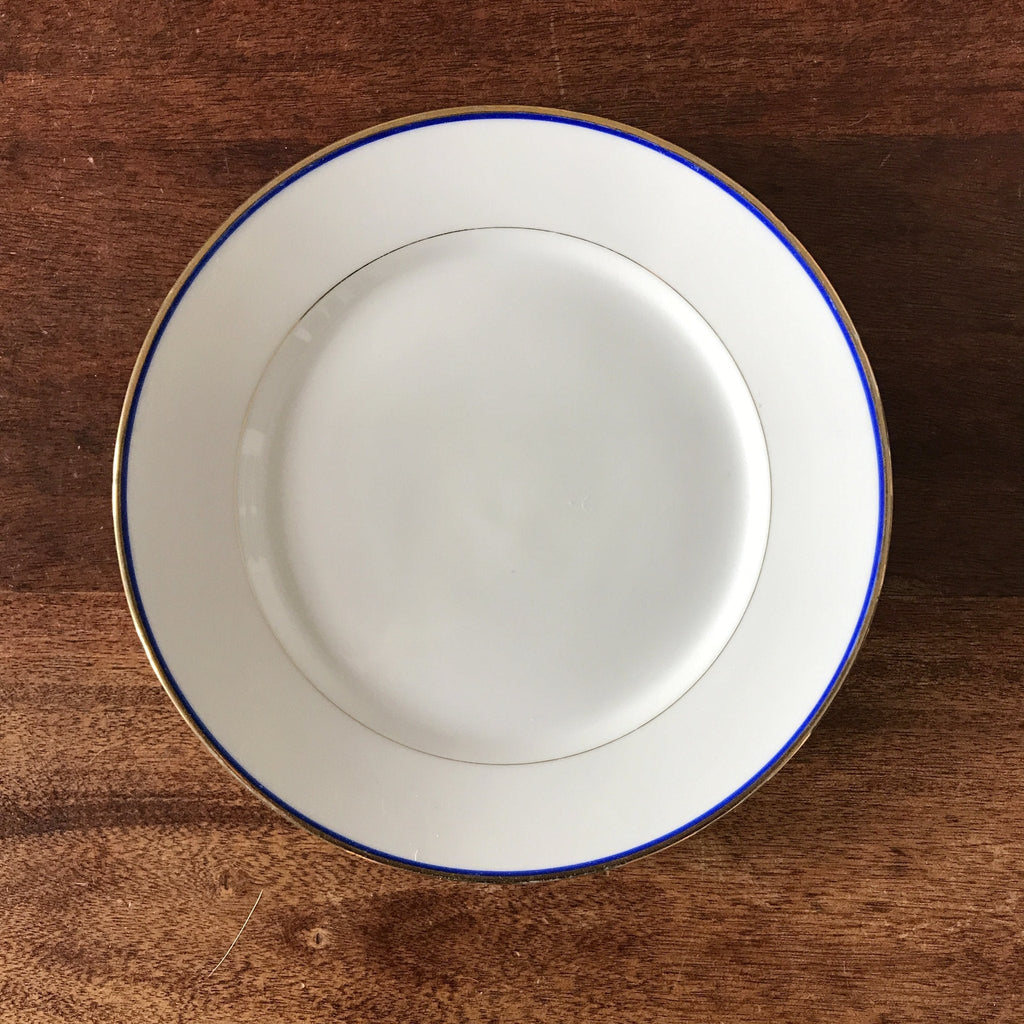 Lot de 6 assiettes plates en porcelaine blanche de Limoges liserés doré et bleu UML France par Hello Broc brocante en ligne