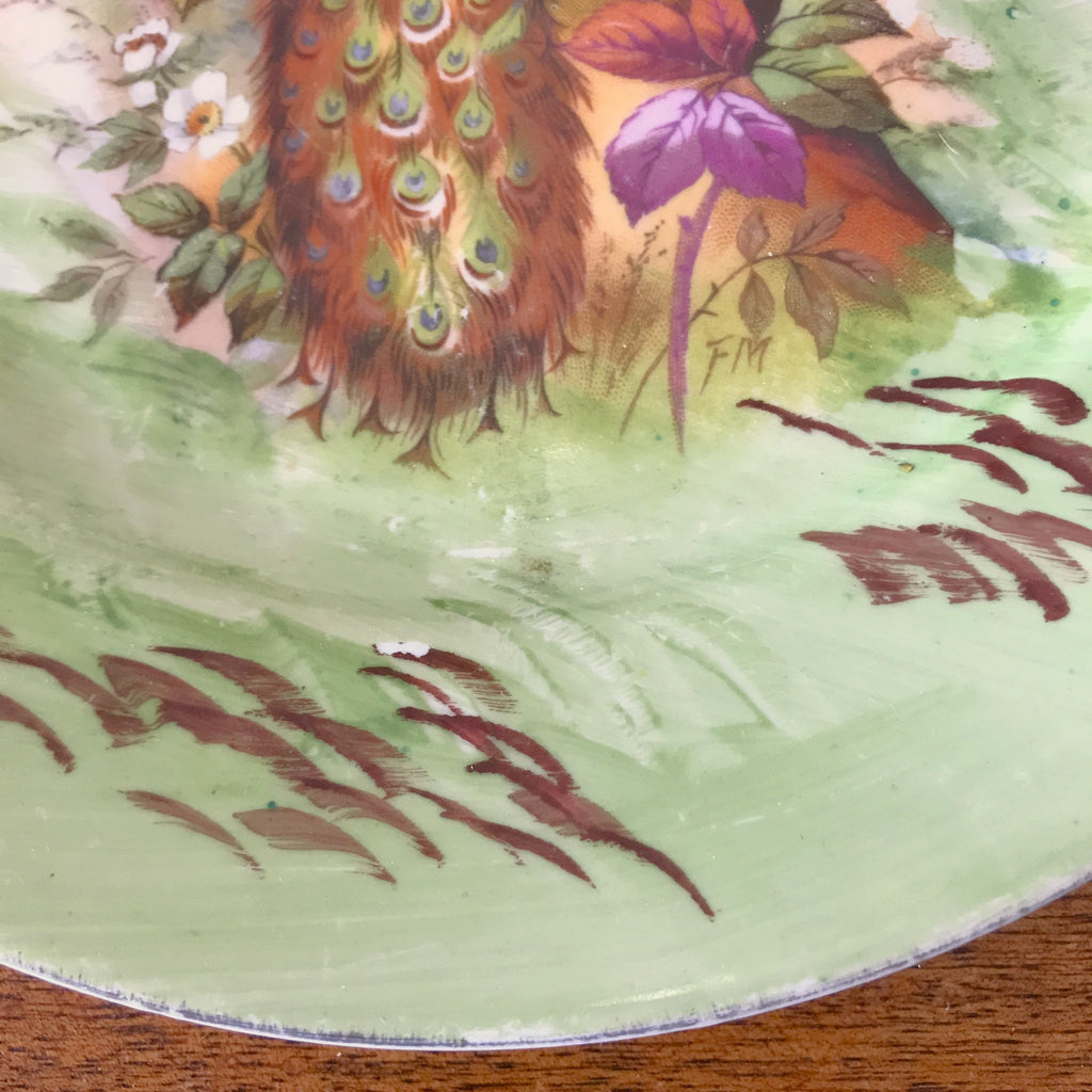 Assiette de collection murale en porcelaine de Limoges décor paons J.B.T & Cie début XXème siècle par Hello Broc brocante en ligne