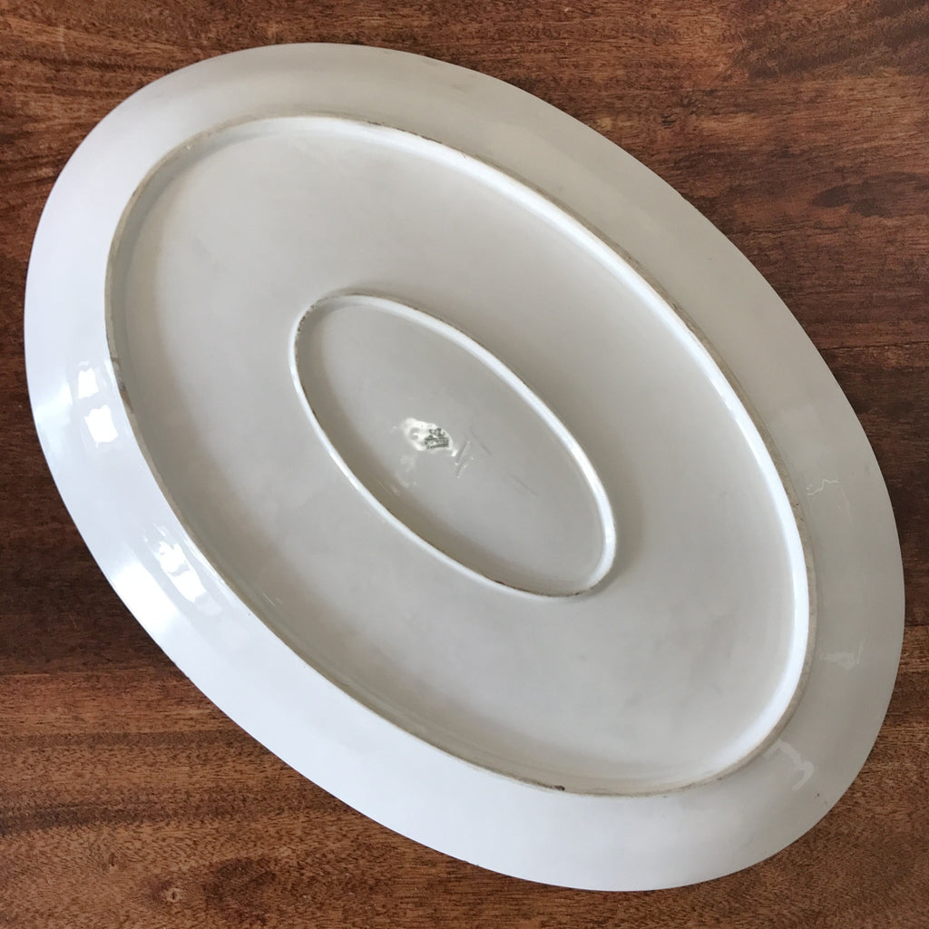 Très grand plat de service ovale et creux en porcelaine de Limoges P.L. 52 x 35 cm par Hello Broc brocante en ligne