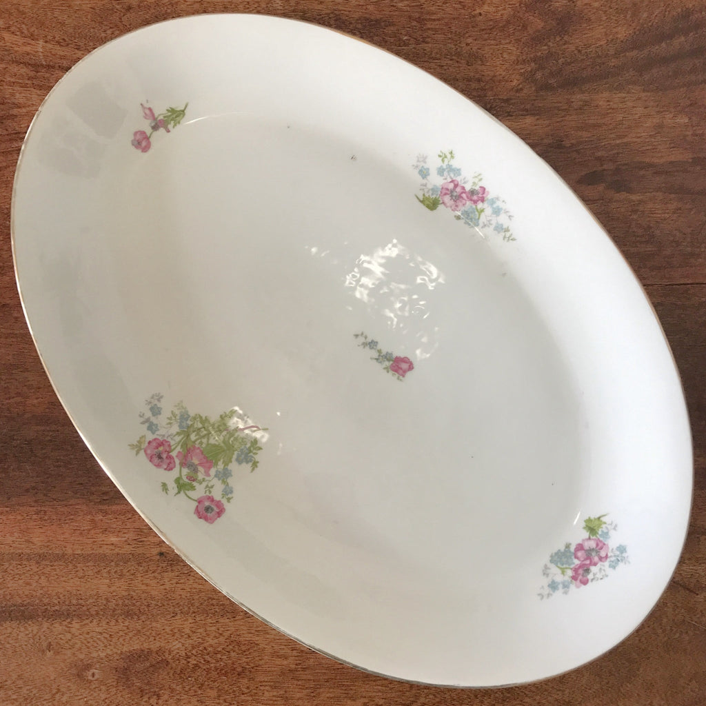 Très grand plat de service ovale et creux en porcelaine de Limoges P.L. 52 x 35 cm par Hello Broc brocante en ligne