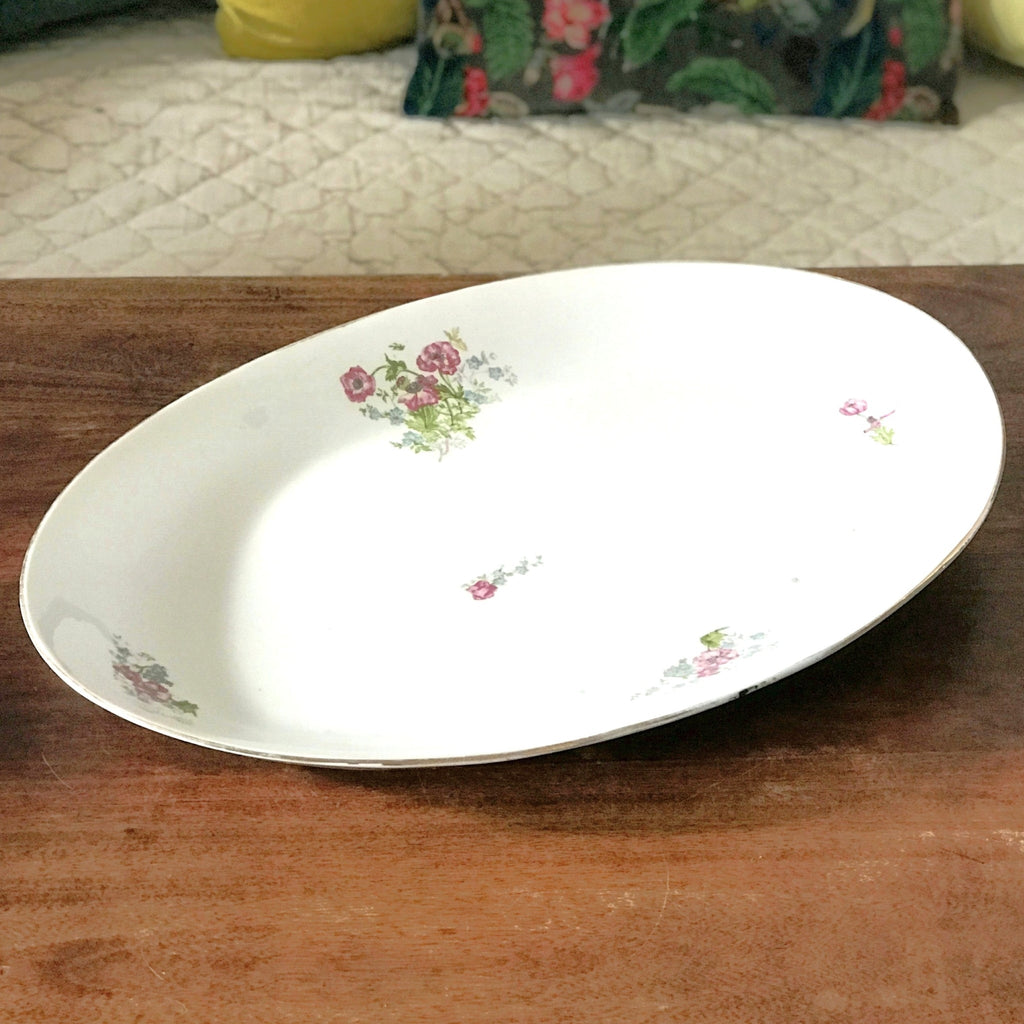 Très grand plat de service ovale et creux en porcelaine de Limoges P.L. 52 x 35 cm par Hello Broc brocante en ligne