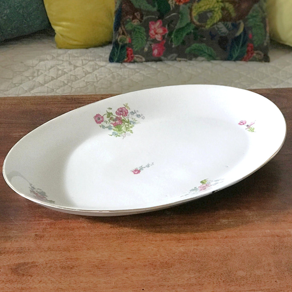 Très grand plat de service ovale et creux en porcelaine de Limoges P.L. 52 x 35 cm par Hello Broc brocante en ligne