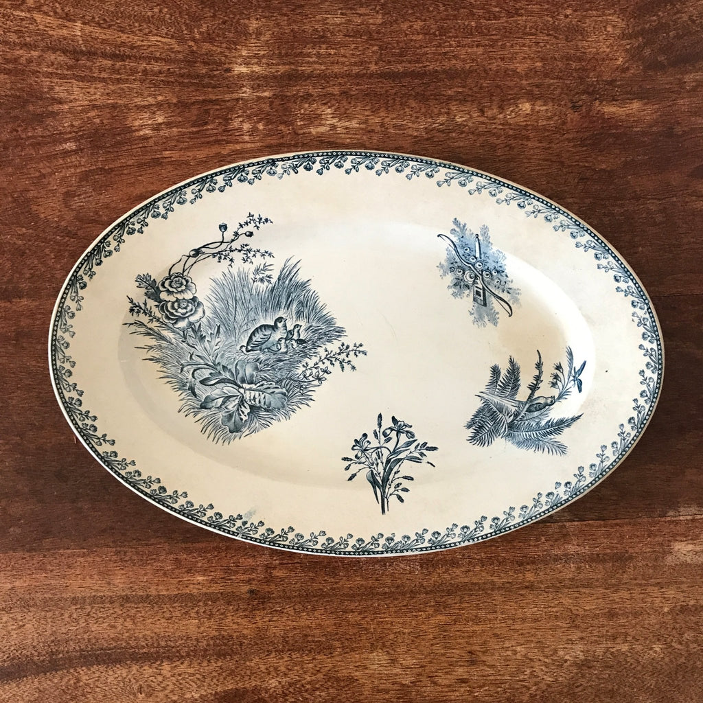 Plat de service ovale en faïence de Pexonne décor Oiseaux par Hello Broc brocante en ligne