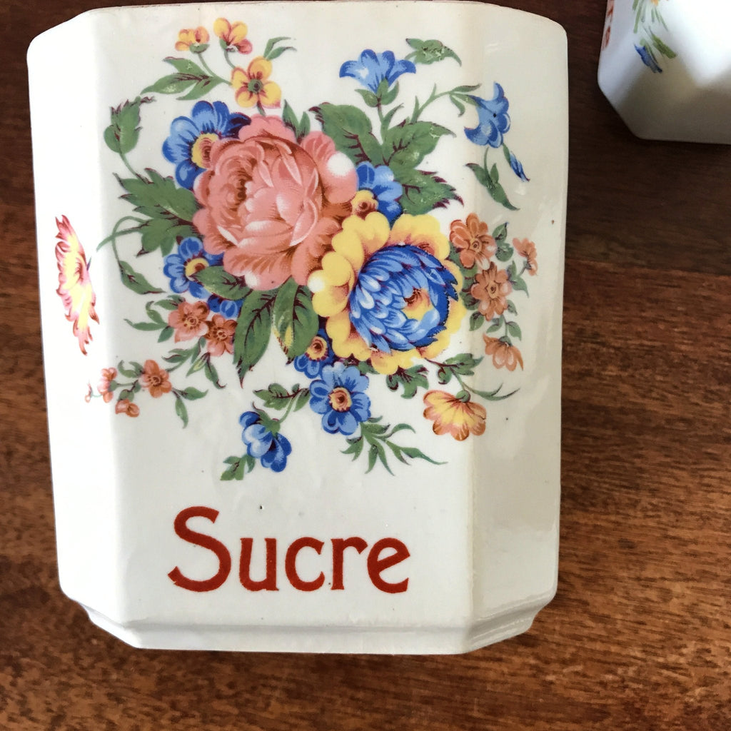 Ensemble de 4 pots à épices en faïence fine et décor fleurs multicolores Circa 1930 par Hello Broc brocante en ligne