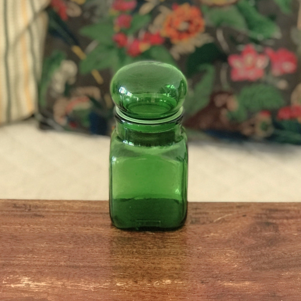 Petit bocal publicitaire Ariel en verre moulé vert années 60 par Hello Broc brocante en ligne