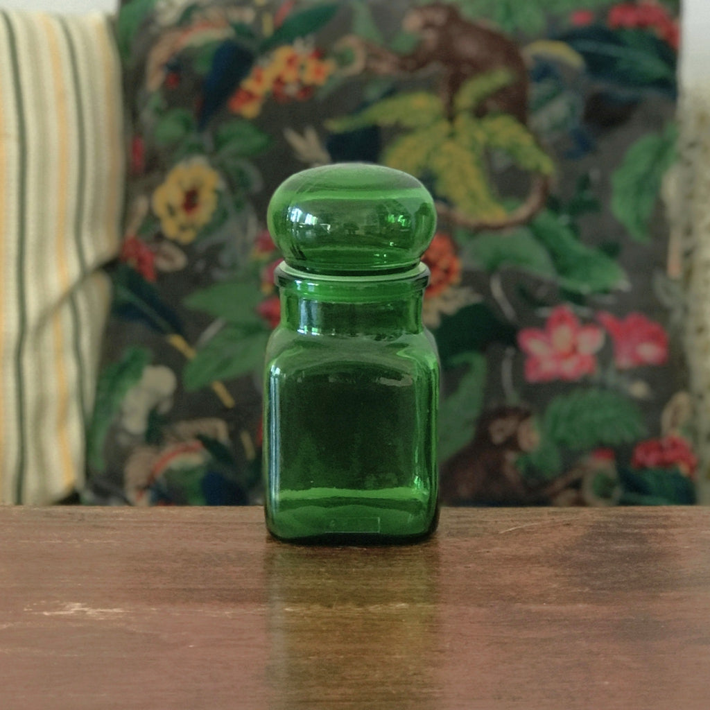 Petit bocal publicitaire Ariel en verre moulé vert années 60 par Hello Broc brocante en ligne