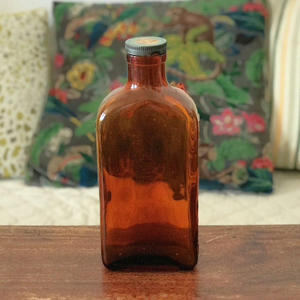 Grand flacon de médicament ancien en verre moulé ambré des Laboratoires J.L. Châtelain par Hello Broc brocante en ligne