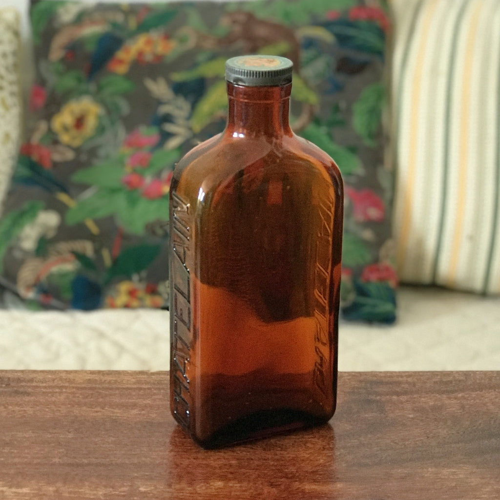 Grand flacon de médicament ancien en verre moulé ambré des Laboratoires J.L. Châtelain par Hello Broc brocante en ligne