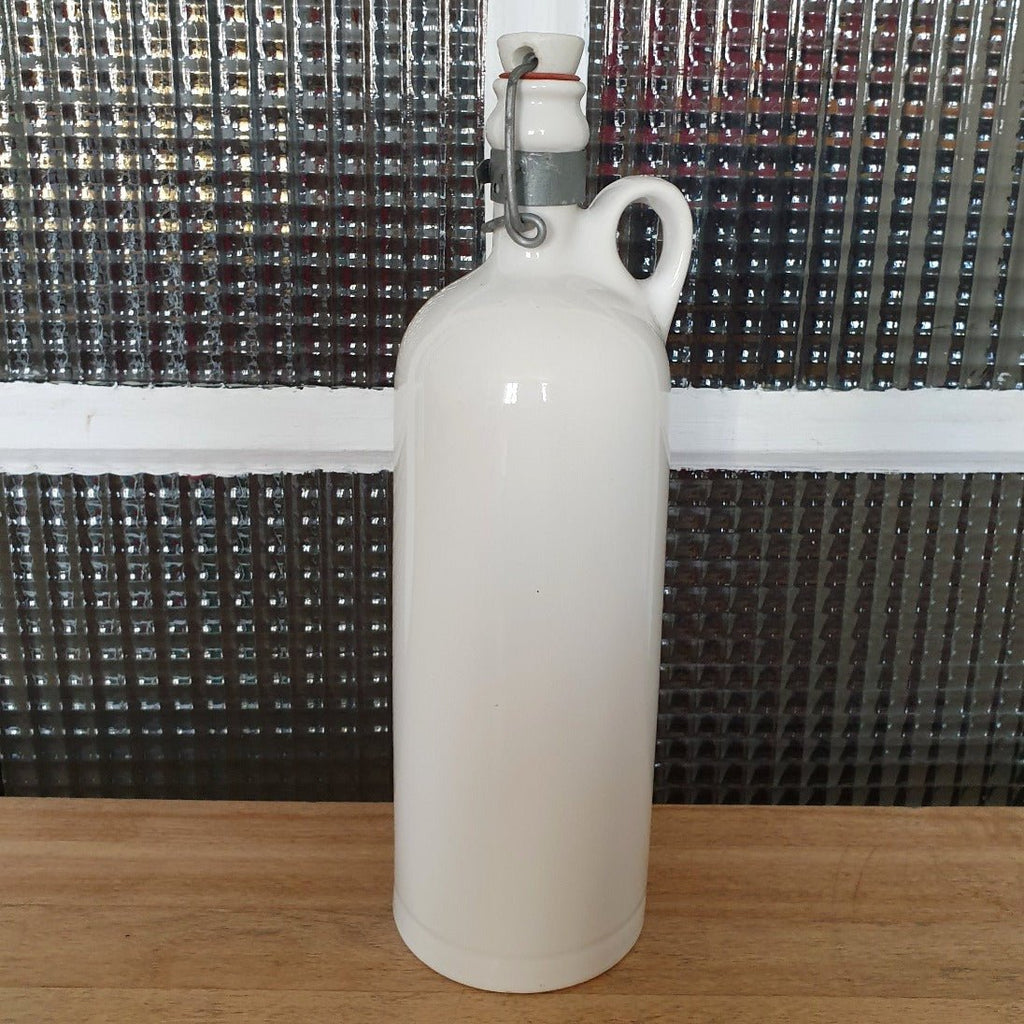 Bouillote en grès blanc vernissé avec son bouchon en porcelaine par Hello Broc brocante en ligne