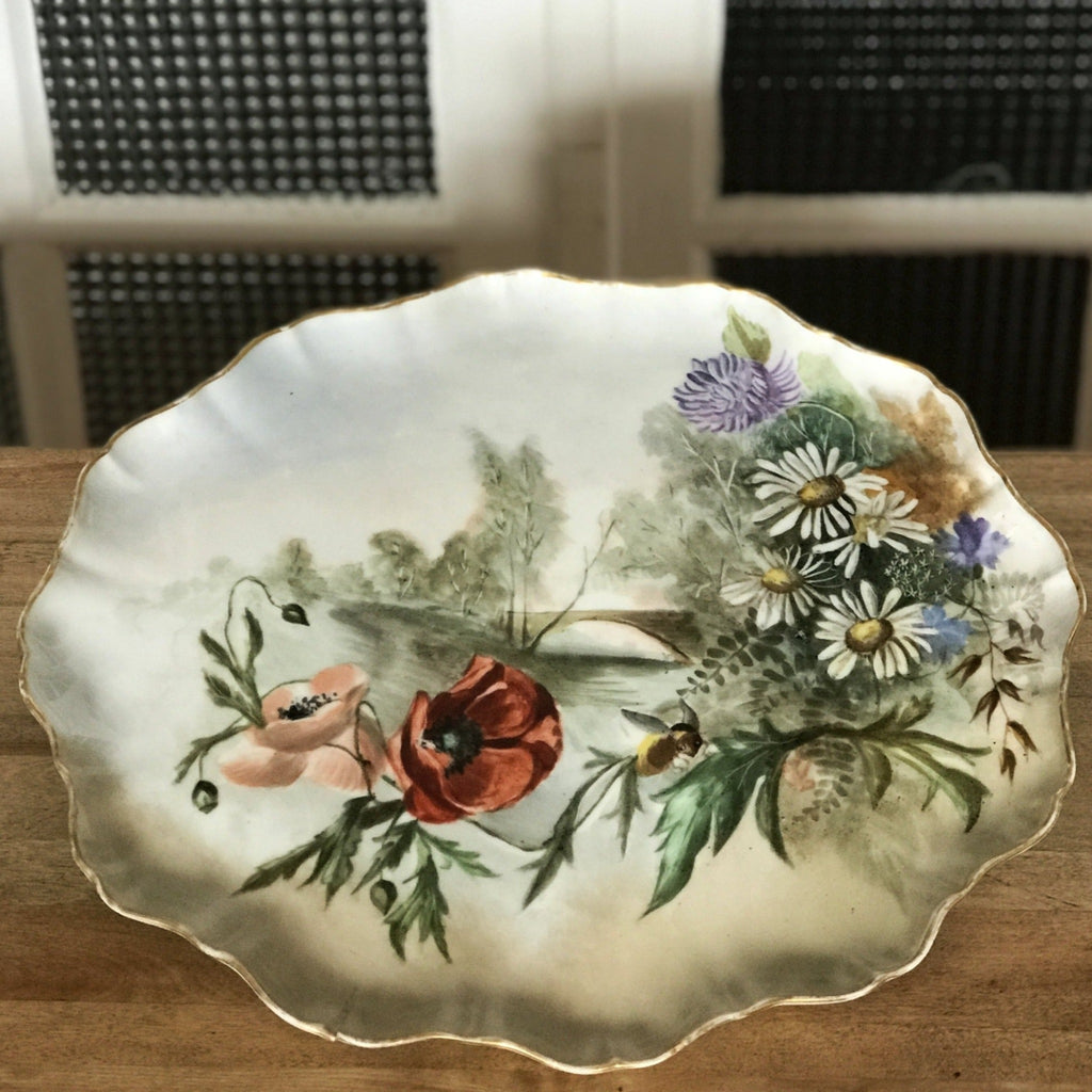 Grand plat en porcelaine de Limoges Jean Pouyat décor polychrome de fleurs peint à la main fin 19e début 20e siècle par Hello Broc brocante en ligne