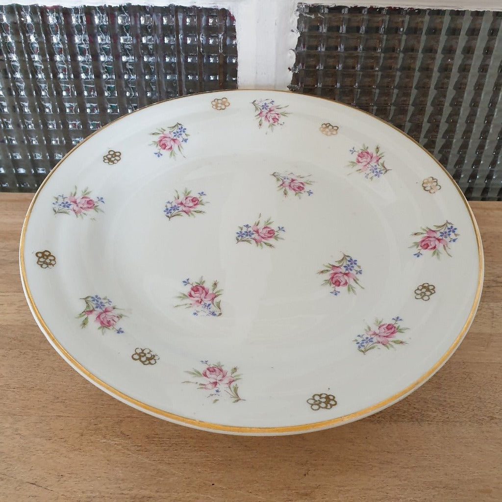 Présentoir à gâteau vintage sur piédouche en porcelaine de Limoges décor fleurs par Hello Broc brocante en ligne