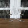 Lot de 3 ou 4 verres à vin sur pied en cristal gravé