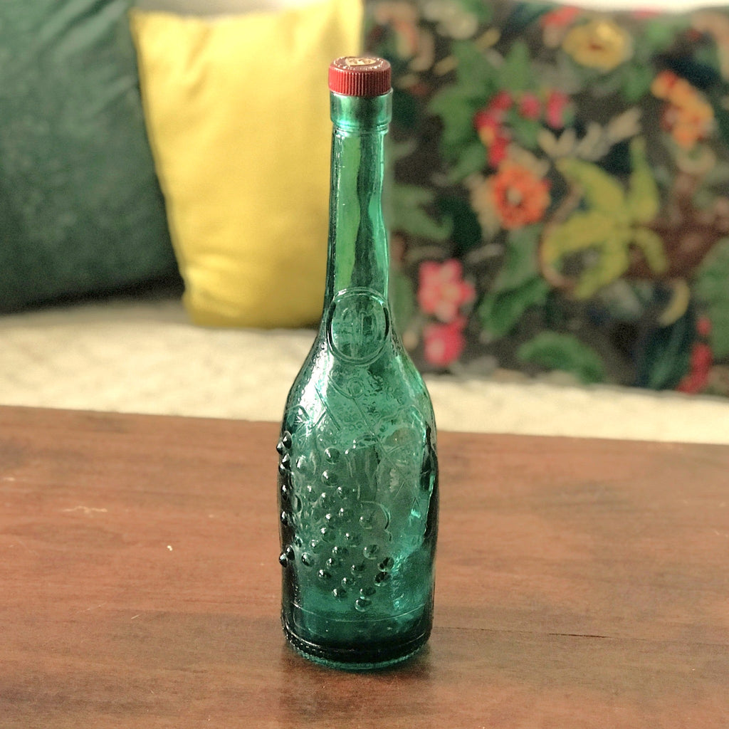 Bouteille décorative vintage bleue au long col en verre moulé par Hello Broc brocante en ligne