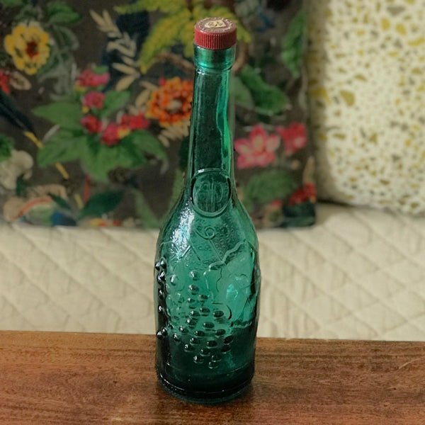 Bouteille décorative vintage bleue au long col en verre moulé par Hello Broc brocante en ligne