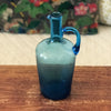 Petite bouteille vintage décorative en verre soufflé bleu avec anse par Hello Broc brocante en ligne