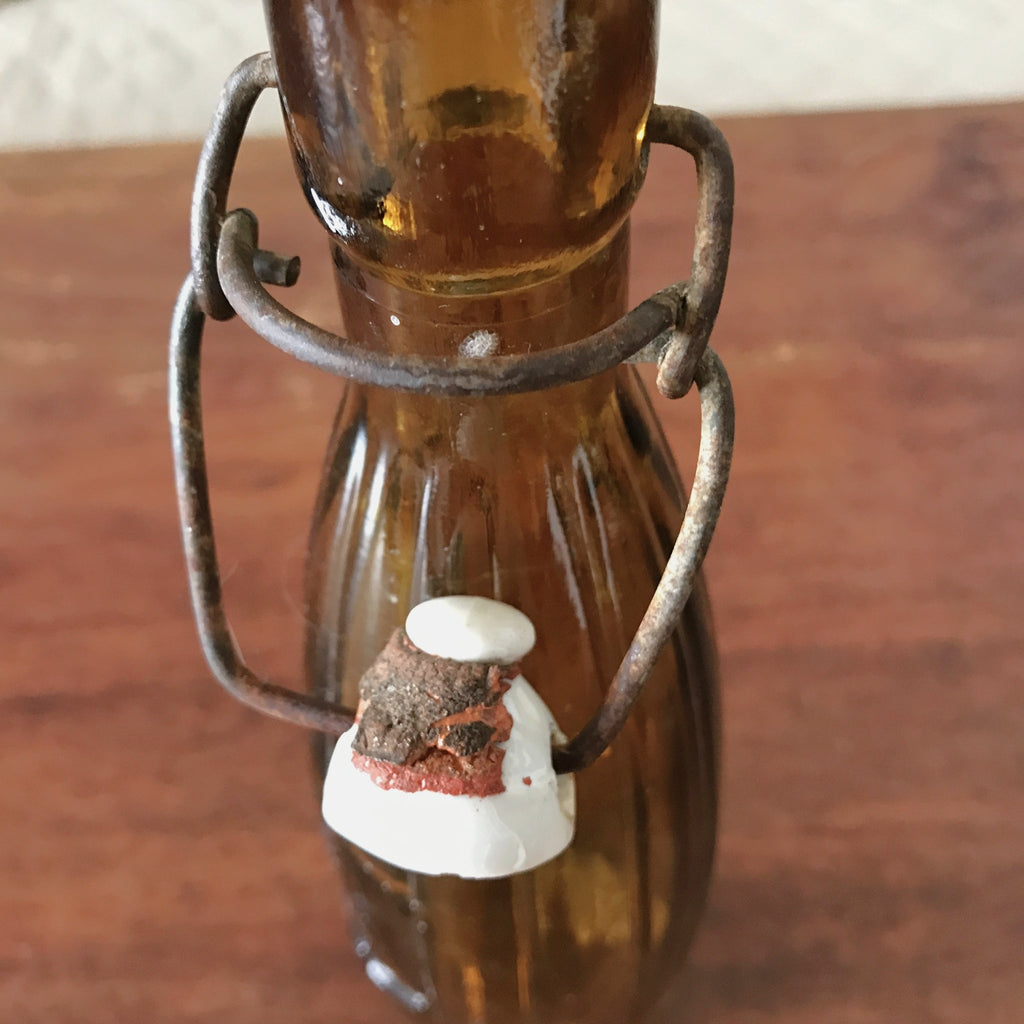 Ancienne bouteille de bière en verre moulé ambré de 48 cl brasserie à Revel France par Hello Broc brocante en ligne
