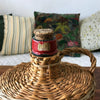 Bouteille dans son étui en rotin forme rectangulaire avec anse tressée par Hello Broc brocante en ligne