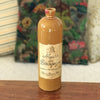 Bouteille vintage en grès marron jaune moutarde Marc de Bourgogne 1967 par Hello Broc brocante en ligne