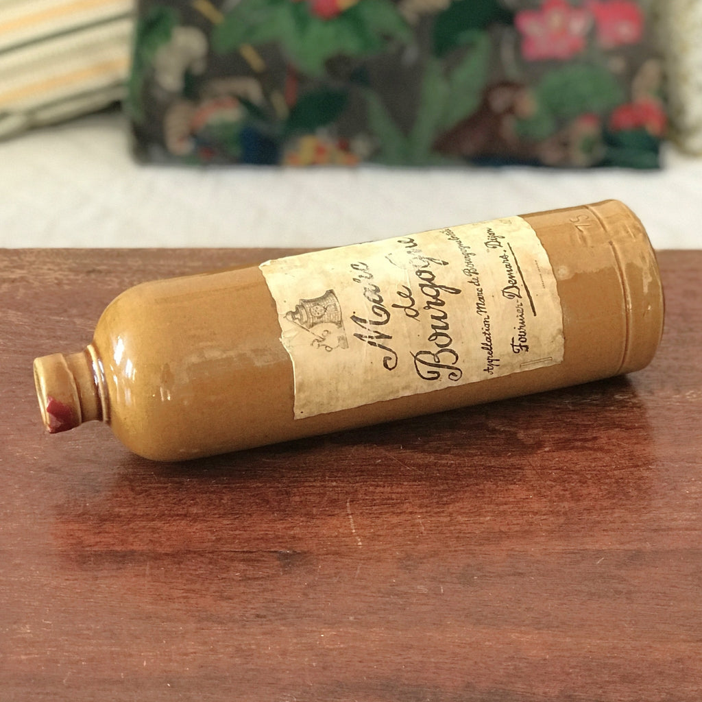 Bouteille vintage en grès marron jaune moutarde Marc de Bourgogne 1967 par Hello Broc brocante en ligne