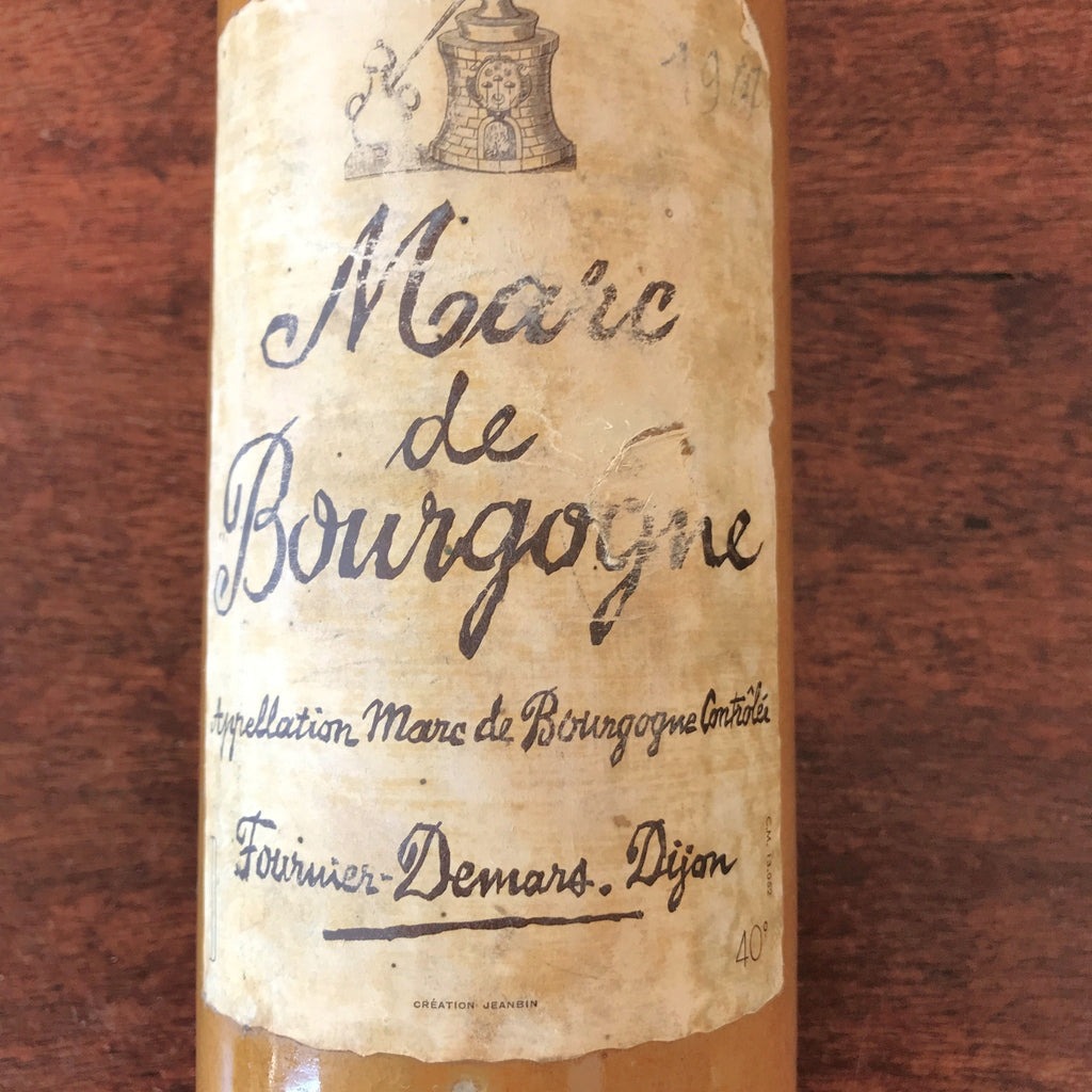 Bouteille vintage en grès marron jaune moutarde Marc de Bourgogne 1967 par Hello Broc brocante en ligne