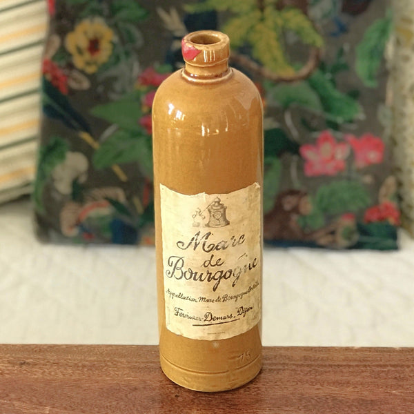 Bouteille vintage en grès marron jaune moutarde Marc de Bourgogne 1967 par Hello Broc brocante en ligne