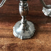 Paire de bougeoirs à 3 feux 2 branches en métal argenté Swanski par Hello Broc brocante en ligne