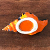 Cendrier vintage en céramique orange en forme de coquillage années 70 par Hello Broc brocante en ligne