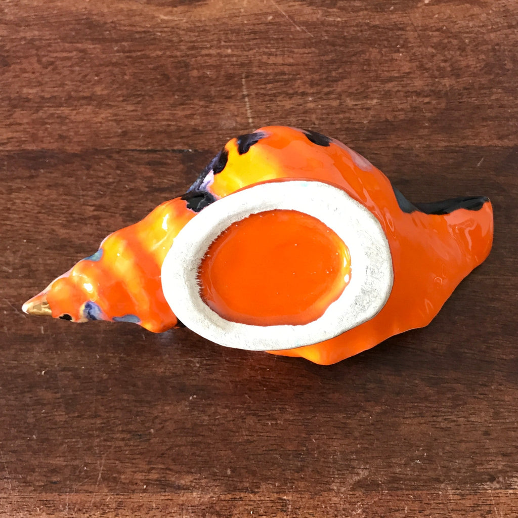 Cendrier vintage en céramique orange en forme de coquillage années 70 par Hello Broc brocante en ligne