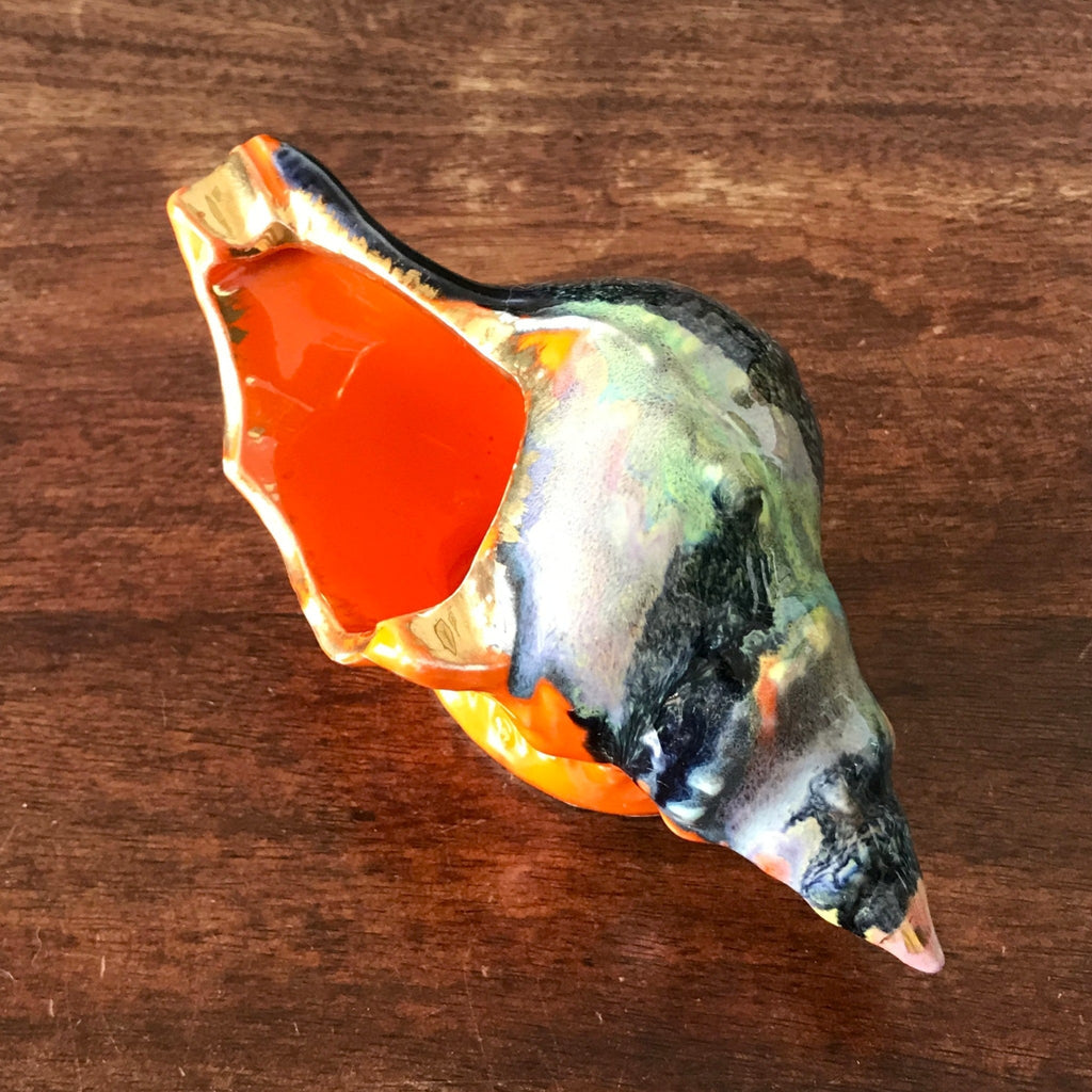 Cendrier vintage en céramique orange en forme de coquillage années 70 par Hello Broc brocante en ligne