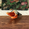 Cendrier vintage en céramique orange en forme de coquillage par Hello Broc brocante en ligne