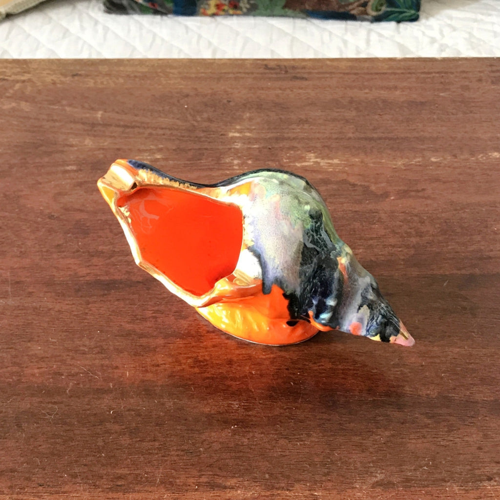 Cendrier vintage en céramique orange en forme de coquillage années 70 par Hello Broc brocante en ligne
