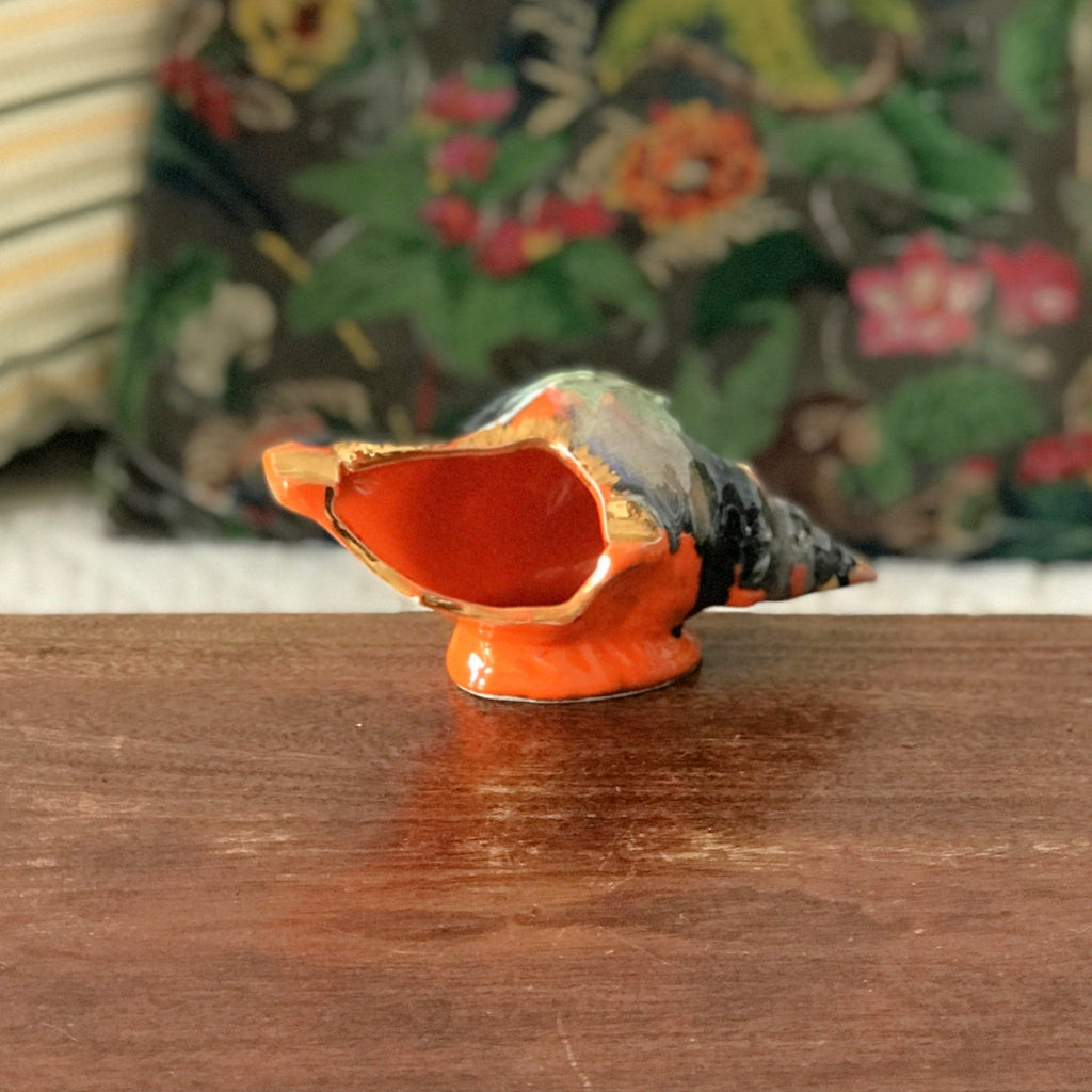 Cendrier vintage en céramique orange en forme de coquillage années 70 par Hello Broc brocante en ligne