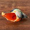 Cendrier vintage en céramique orange en forme de coquillage années 70 par Hello Broc brocante en ligne