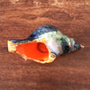 Cendrier vintage en céramique orange en forme de coquillage années 70 par Hello Broc brocante en ligne
