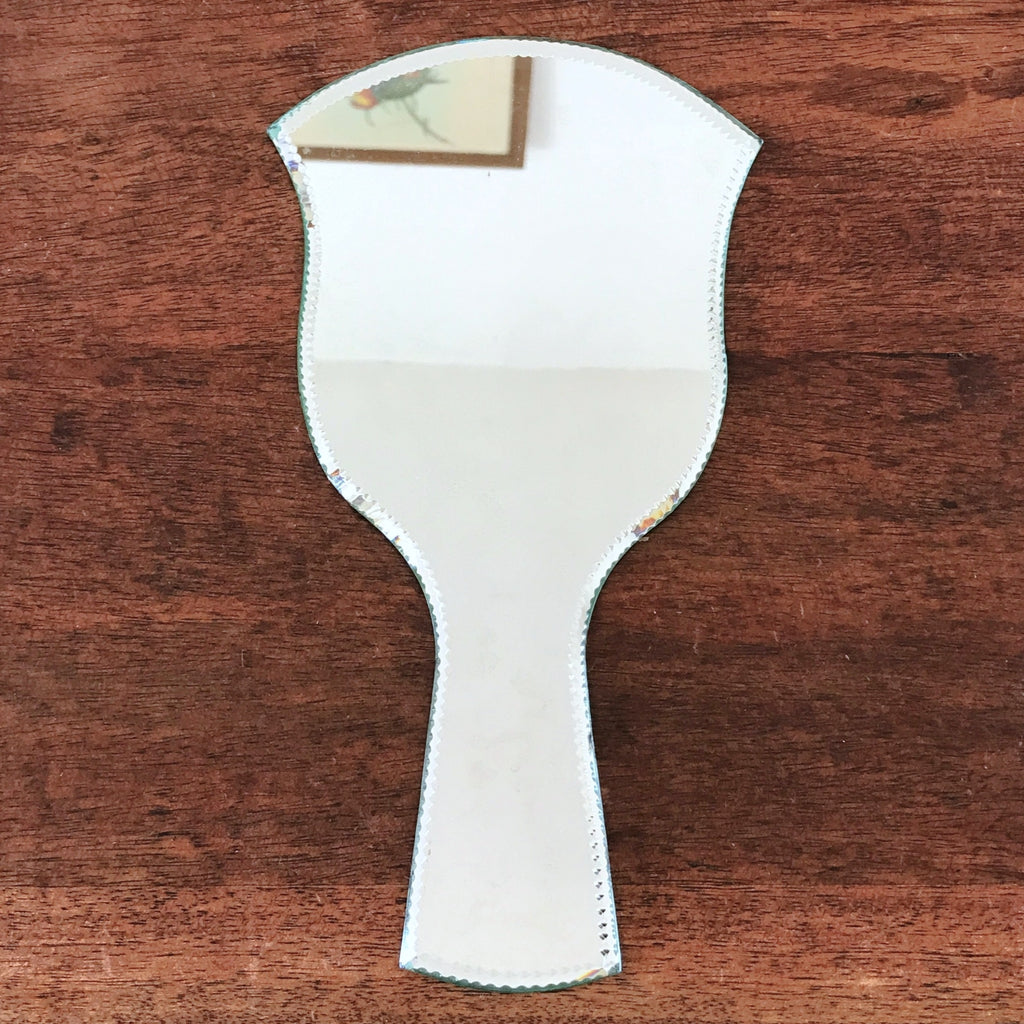 Miroir face à main bordure biseautée et taillée sur le biseau par Hello Broc brocante en ligne