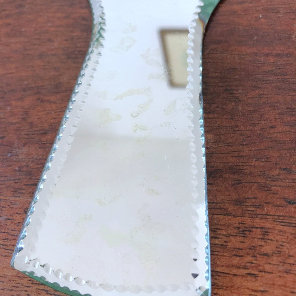 Miroir face à main bordure biseautée et taillée sur le biseau par Hello Broc brocante en ligne