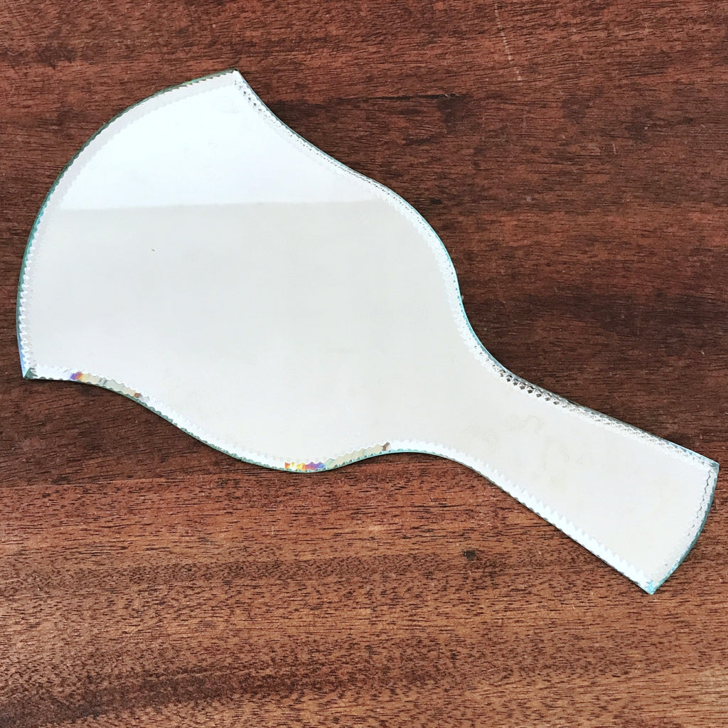 Miroir face à main bordure biseautée et taillée sur le biseau par Hello Broc brocante en ligne