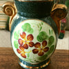 Petit vase en céramique verte avec un bouquet de fleurs en médaillon Enghien France
