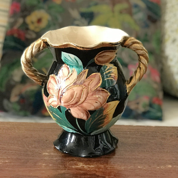 Vase en céramique de Vallauris peint main à décor de fleurs multicolores sur fond noir années 50 par Hello Broc brocante en ligne