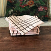 Lot de 6 serviettes de table damassées rose quadrillage marron - Hello Broc