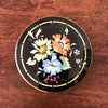 Ancienne petite bonbonnière en céramique Villeroy & Boch décor Xena bouquet de fleurs multicolores sur fond noir par Hello Broc brocante en ligne