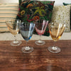 Lot de 4 verres à vin cuit multicolores de forme évasée sur pied par Hello Broc brocante en ligne