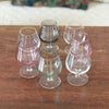 Ensemble de 7 verres à cognac vintage sur pied en verre moulé multicolores dans les tons pastels de 13 cl par Hello Broc brocante en ligne