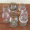 Ensemble de 7 verres à cognac vintage sur pied en verre moulé multicolores dans les tons pastels de 13 cl par Hello Broc brocante en ligne