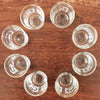 Ensemble de 8 verres vintage à digestif , liqueur ou shooter liserés dorés et scène rupestre imprimée années 60 par Hello Broc brocante en ligne