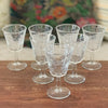 Lot de 7 verres à vin blanc ou à digestif sur pied décor arabesques attribution Luminarc contenance 6 cl par Hello Broc brocante en ligne
