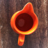 Petite cruche ou grand pot à lait céramique orange Niderviller France par Hello Broc brocante en ligne