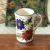 Grand pichet droit en céramique décor grosses fleurs contenance 1,5 litre par Hello Broc brocante en ligne