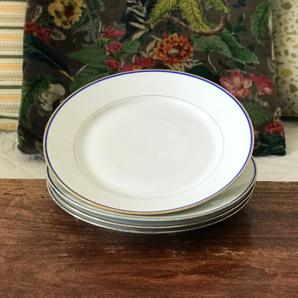 Lot de 4 assiettes plates en porcelaine blanche de Limoges liserés doré et bleu UML France par Hello Broc brocante en ligne