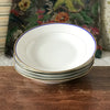 Lot de 5 assiettes creuses en porcelaine blanche de Limoges liserés doré et bleu UML France par Hello Broc brocante en ligne